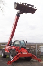 engin-de-manutention-destine-au-transfert-de-charge-permettant-egalement-le-chargement-et-le-dechargement-